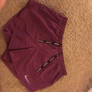 Nike purple dry-fit running shorts. Size small